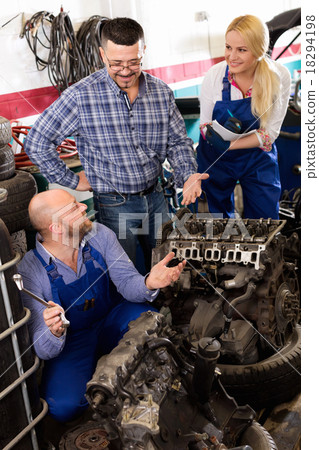 Service crew and driver near car Service crew and driver near car 18294198