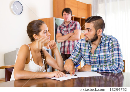 men and woman near desk men and woman near desk 18294762