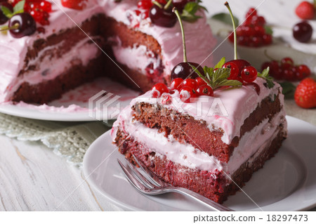 Slice of homemade berry cake with pink cream Slice of homemade berry cake with pink cream 18297473