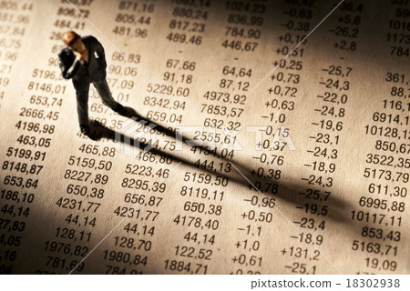 Broker stands on stock price chart Broker stands on stock price chart 18302938