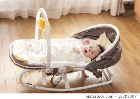 Baby on the bouncer 18303307