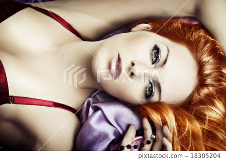 Young sexy woman with green eyesclose up  18305204