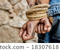 Prisoner bound with rope 18307618