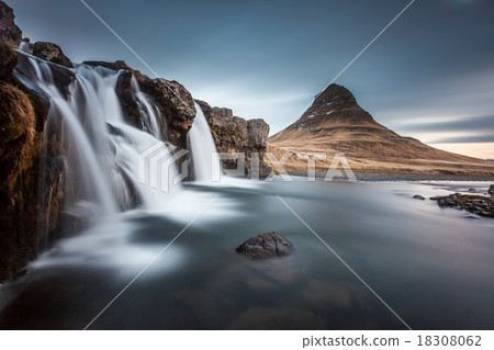 kirkjufellsfoss and kirkjufell in Iceland. kirkjufellsfoss and kirkjufell in Iceland. 18308062