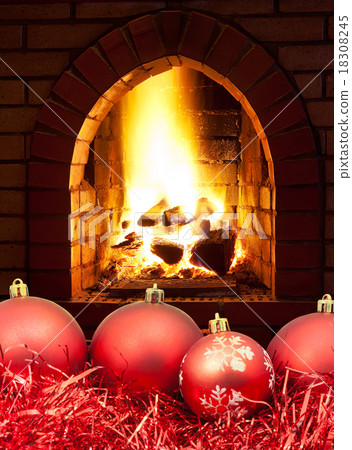 red Christmas balls and tinsel with fireplace 18308245