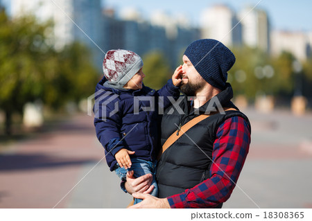 Father and son walking in fall Father and son walking in fall 18308365