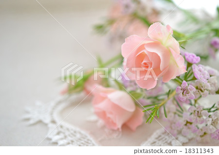 Roses and wax flowers 18311343