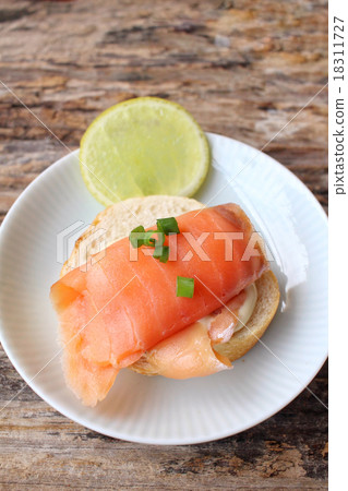 Baguette bread with smoked salmon Baguette bread with smoked salmon 18311727