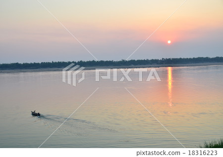 Cambodia Krache Sunset over the Mekong River and ferryboat Cambodia Krache Sunset over the Mekong River and ferryboat 18316223
