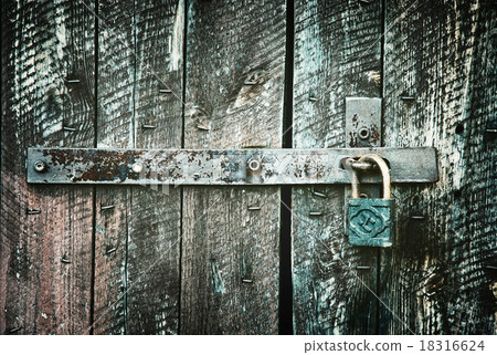 Locked wooden doors close up, retro style Locked wooden doors close up, retro style 18316624