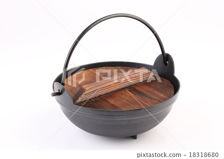 Black iron pot with wooden lid isolated on white Black iron pot with wooden lid isolated on white 18318680
