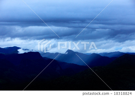 Amazing nimbus with rain over rainforest mountain 18318824