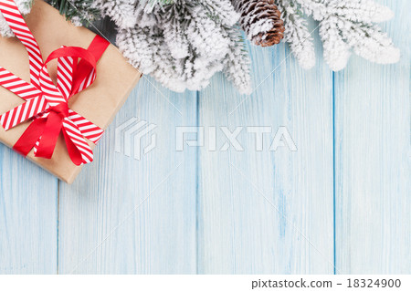 Christmas gift box and tree branch Christmas gift box and tree branch 18324900