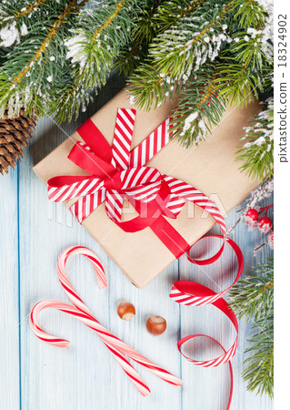 Christmas gift box and tree branch Christmas gift box and tree branch 18324902