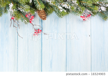 Christmas wooden background with snow fir tree Christmas wooden background with snow fir tree 18324903