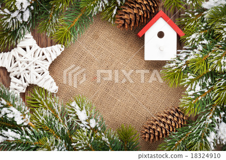 Christmas decor and snow fir tree background Christmas decor and snow fir tree background 18324910