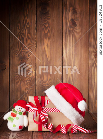 Christmas gift box with santa hat and snowman Christmas gift box with santa hat and snowman 18324912
