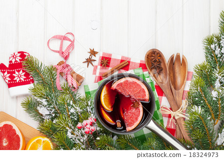Christmas mulled wine on wooden table Christmas mulled wine on wooden table 18324973