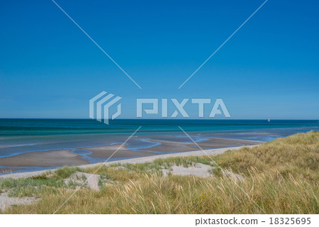 Beach with low tide water Beach with low tide water 18325695