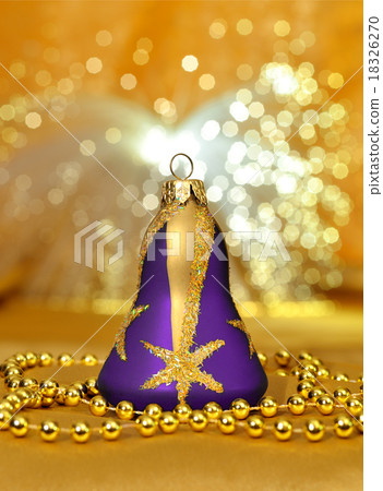 Christmas bauble with beads on golden background Christmas bauble with beads on golden background 18326270