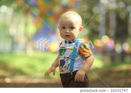 little boy in summer park 18335747