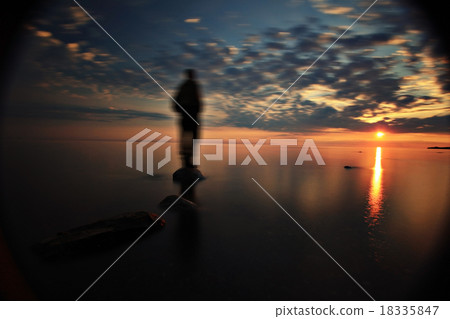 blurred motion people sunset lake blurred motion people sunset lake 18335847