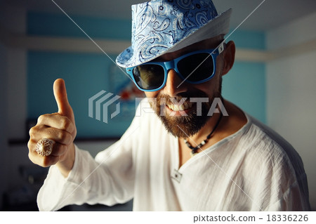 tanned, bearded man in sunglasses vacation concept 18336226
