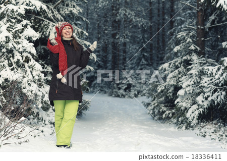 woman in winter forest woman in winter forest 18336411