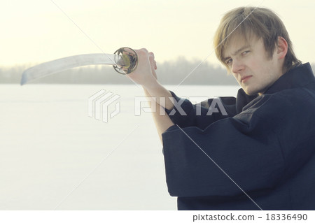 Black oriental martial arts warrior winter training 18336490