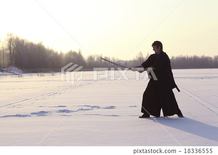 Black oriental martial arts warrior winter training Black oriental martial arts warrior winter training 18336555