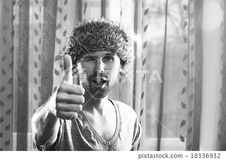 funny portrait of a man in a fur hat funny portrait of a man in a fur hat 18336932
