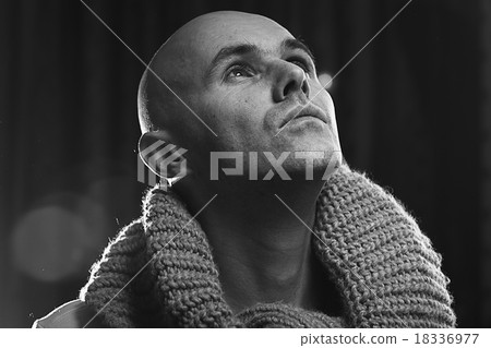 portrait of a man in a sweater 18336977