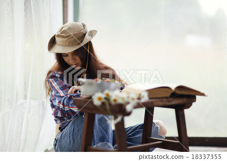 girl with a book in a rustic style girl with a book in a rustic style 18337355