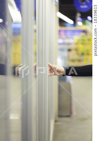 Woman in supermarket 18339615
