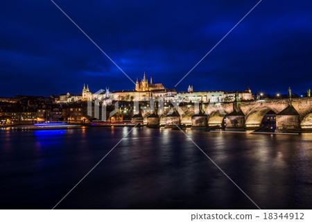 View at night across the Vltava River in Prague 18344912