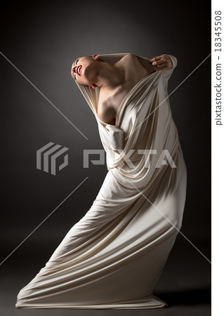 Concept. Beautiful naked girl breaks her cocoon 18345508