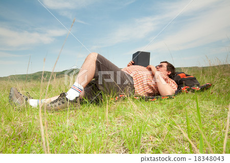 Fat Guy Reading Outdoor 18348043