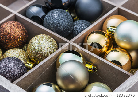 Wooden box filled with christmas balls Wooden box filled with christmas balls 18352379