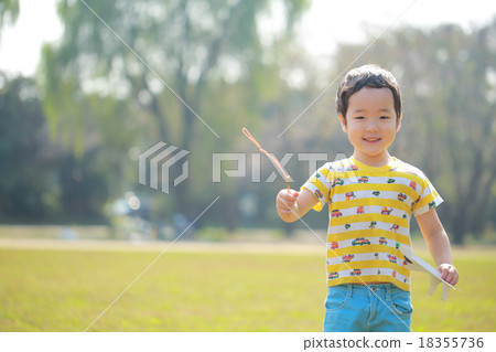 Child to skip paper airplane 18355736
