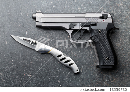 handgun and knife handgun and knife 18359780