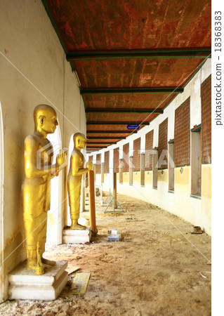 golden image of Buddha is standing , Thailand 18368383