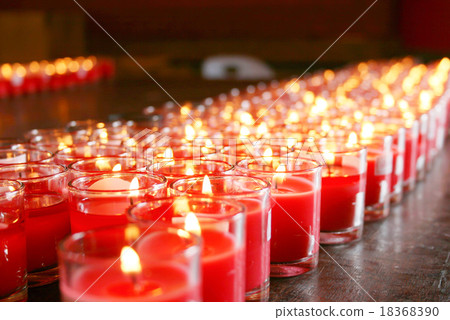 red burning candles in a temple red burning candles in a temple 18368390