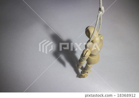 A doll hanging a neck A doll hanging a neck 18368912