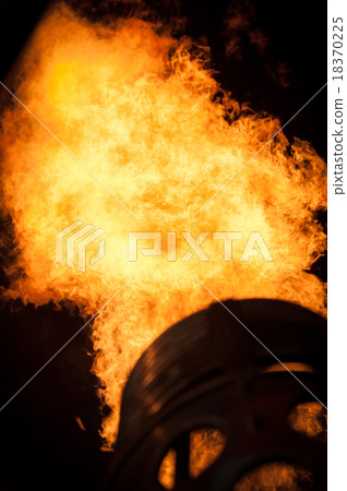 Flames in the night to heat up a hot air balloon. 18370225