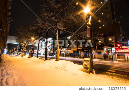 Night street with snow in Sapporo, Hokkaido 18372533