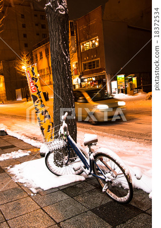 Night street with snow in Sapporo, Hokkaido 18372534