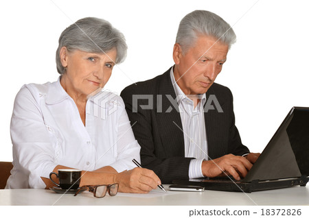 Older couple in the workplace Older couple in the workplace 18372826