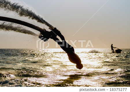 Silhouette of a fly board rider 18375277