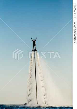Silhouette of a fly board rider 18375280