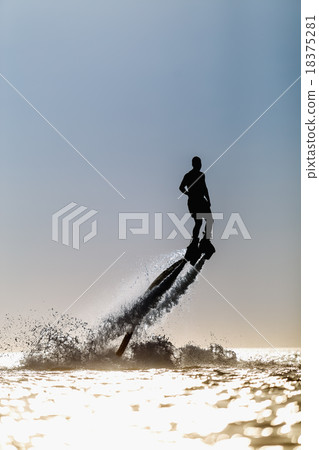 Silhouette of a fly board rider 18375281
